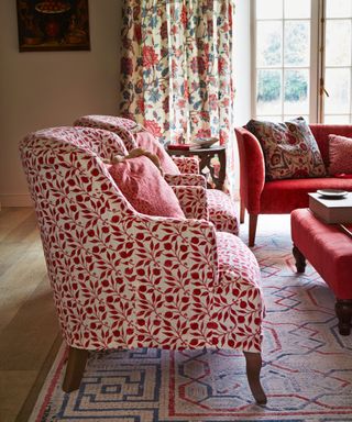 Living room with red armchairs