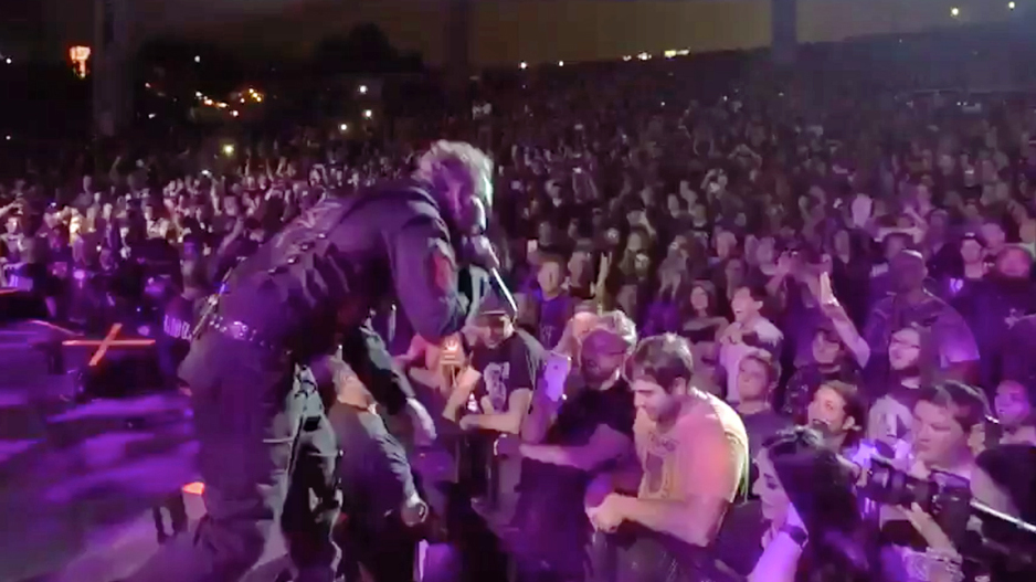 Corey Taylor slaps phone out of fan&#039;s hand while on stage with Slipknot