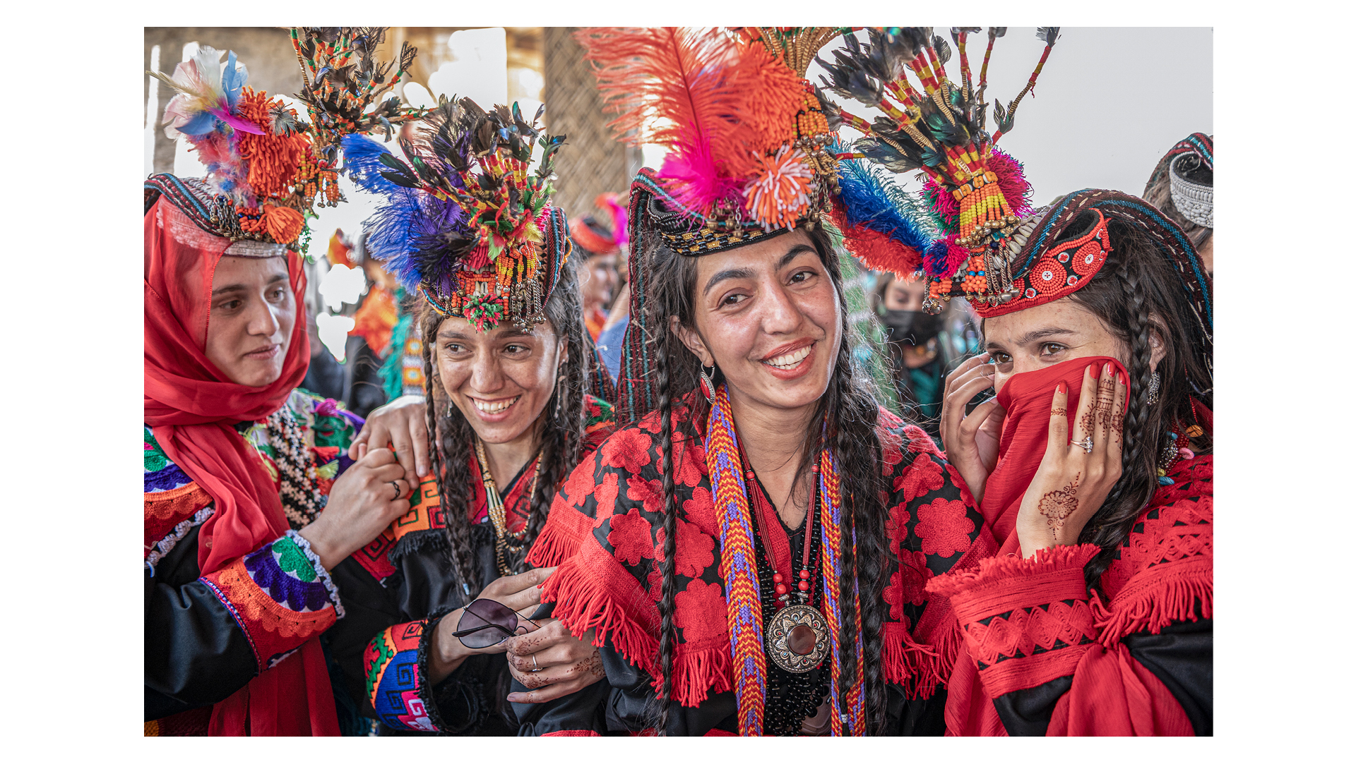 Photograph of girls celebrating during ‘Chilam Joshi,’ also known as the Kalash Spring Festival, in Rumbur, Kalash Valleys, near Chitral in Pakistan, taken by Jo Kearney and which was the Winner of One Shot: Festivals & Celebrations category in Travel Photographer of the Year 2024