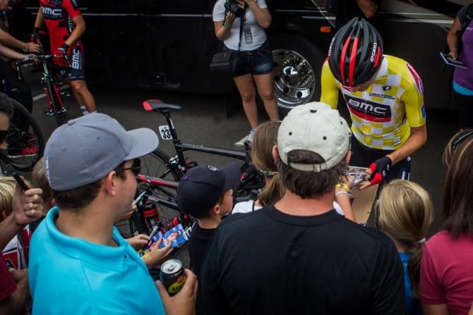 Tejay van Garderen (BMC) signs autographs for fans at the start in Loveland.