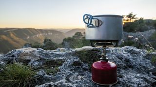 A small camping stove overlooking a mountain