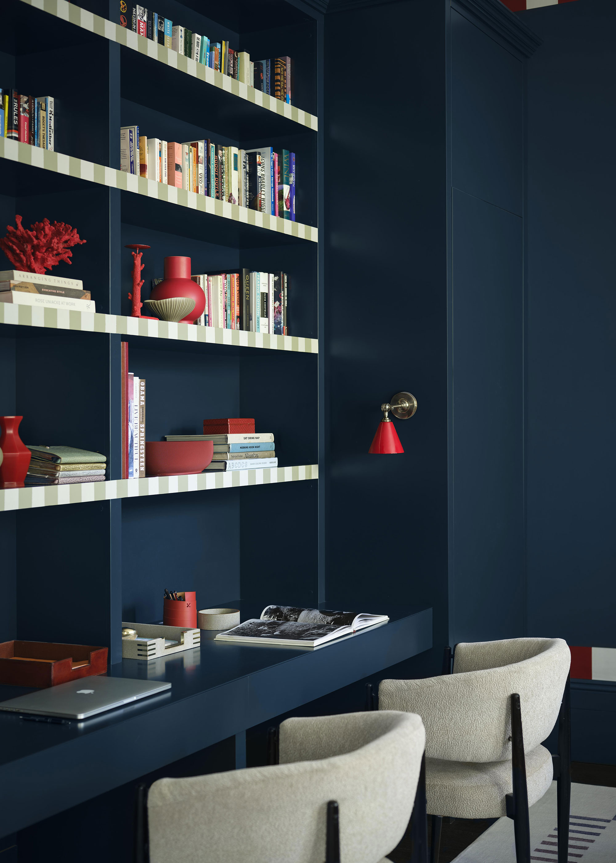 navy home office with full height shelving