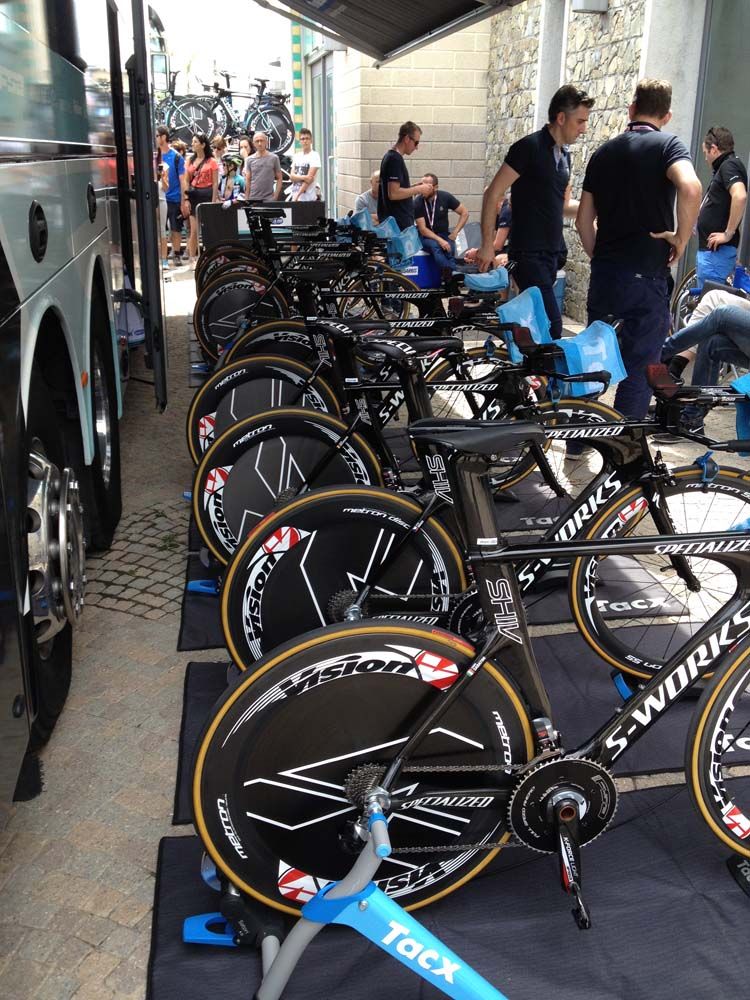 The Etixx-QuickStep Specialized Shiv bikes await in the shade