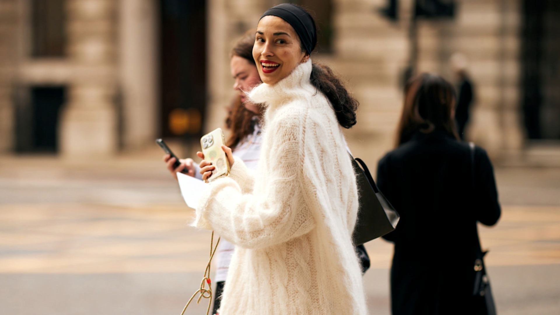 woman wearing a white sweater