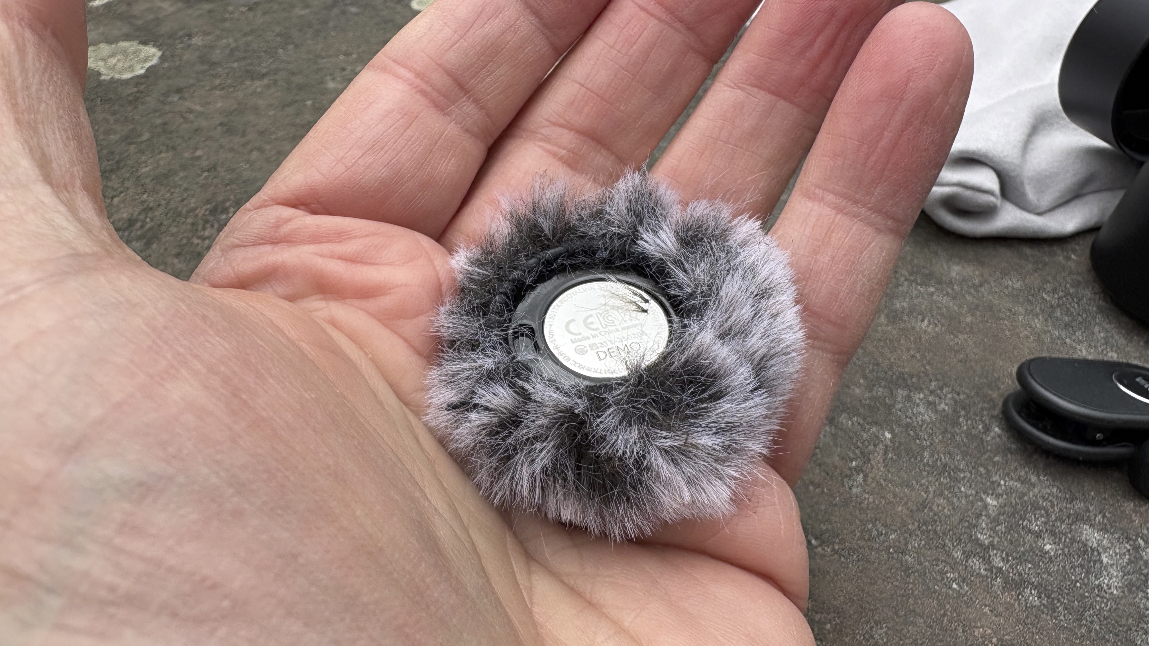 Shot of the circular mic nestled in its fluffy windshield