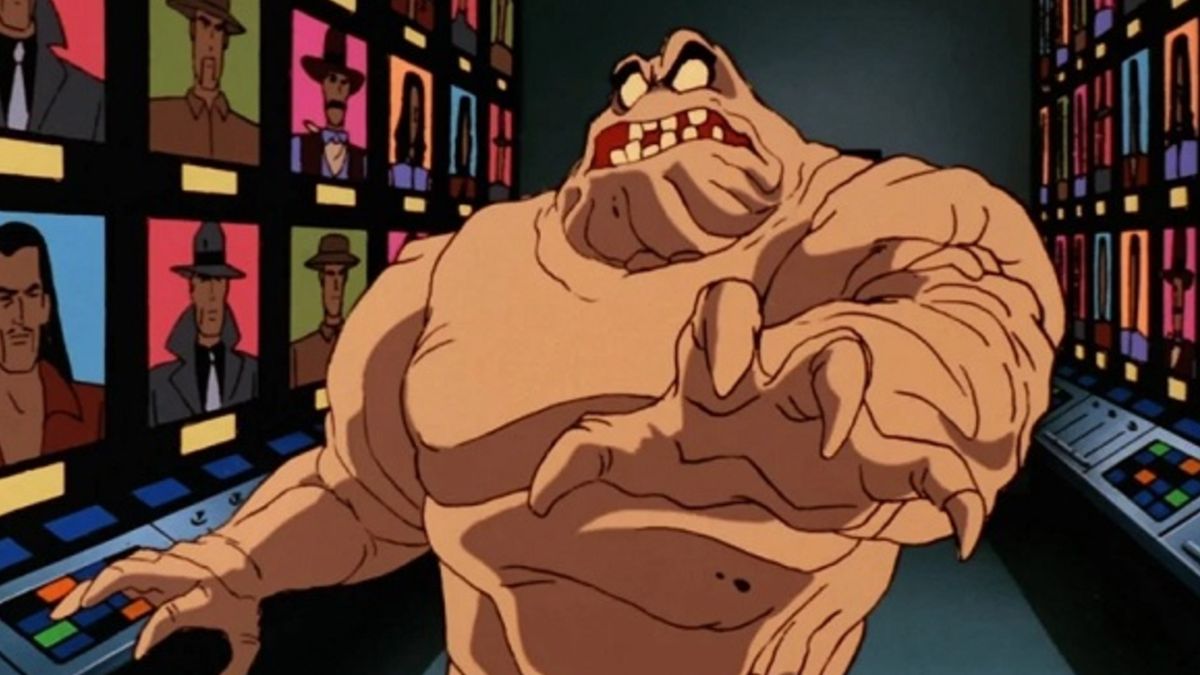 Clayface looking horrified, in a room of television screens, Batman The Animated Series. 