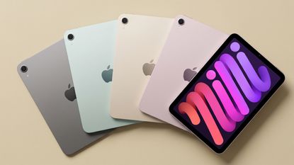 iPad mini 7 in multiple colours on a yellow background