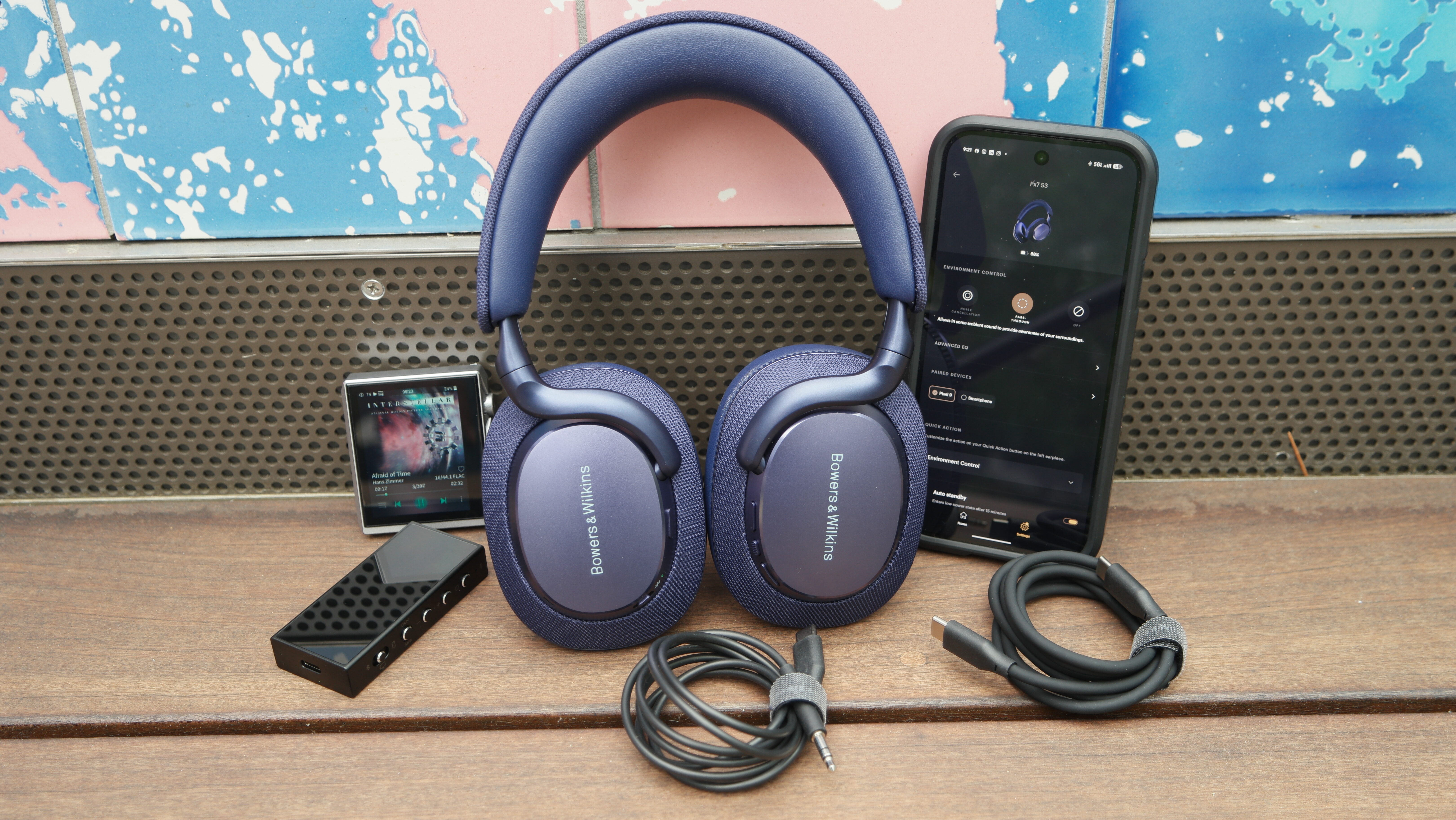 Bowers &amp; Wilkins Px7 S3 on a deck, in the middle of a Google phone, a Hidisz DAP, and Questyle DAC