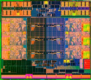 Intel's Ivy Bridge-E die; six CPU cores are clearly visible, along with shared L3 cache and the memory controller up top