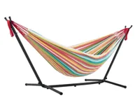 A striped multicoloured hammock with freestanding black base