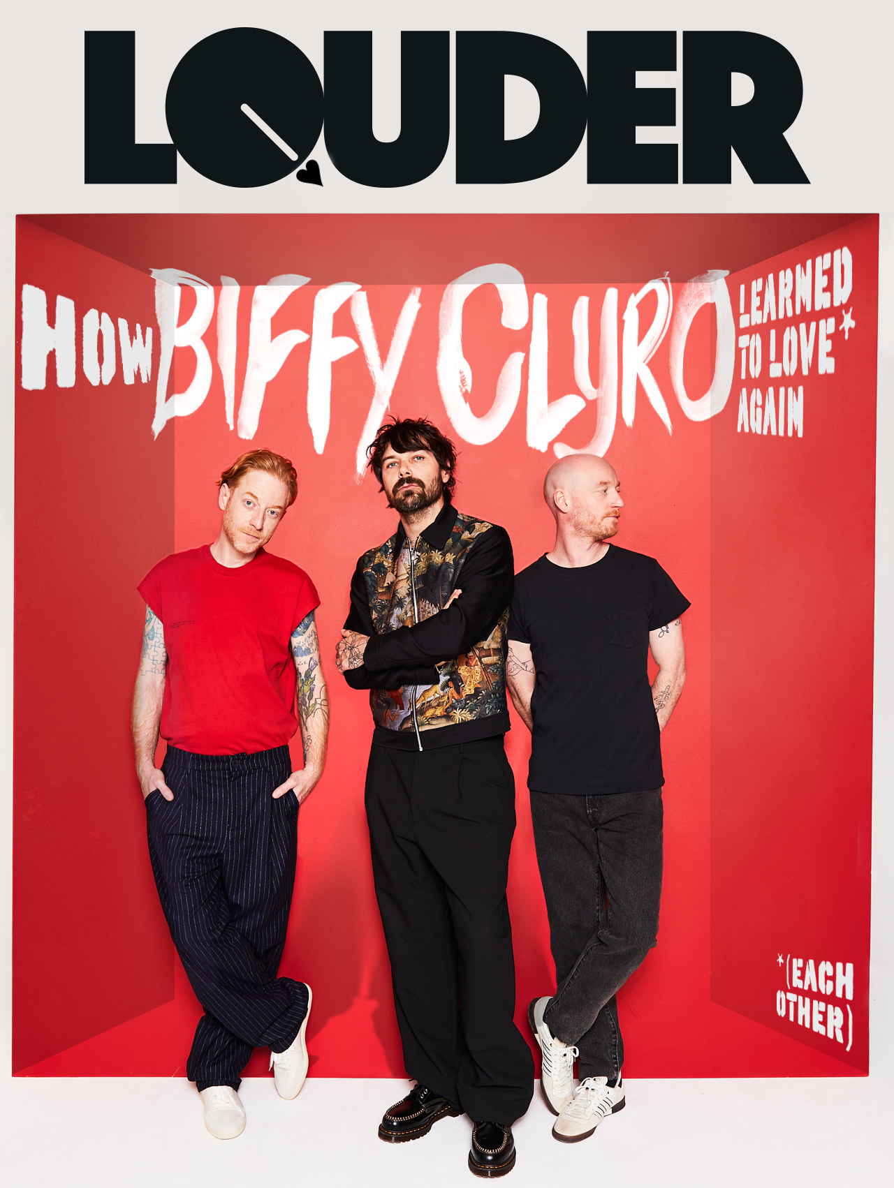 Biffy Clyro on the cover of Louder: the band pose against a red backdrop
