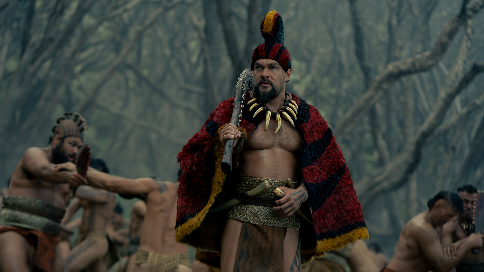 a colorful Hawaiian warrior in full native costume
