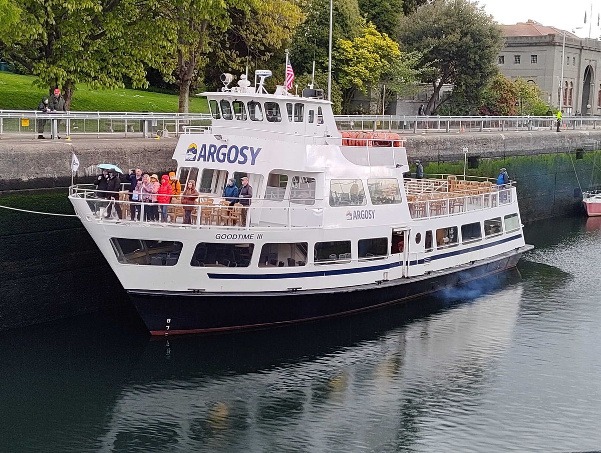A boat on the water with people on it