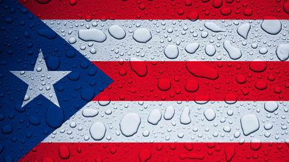 picture of a Puerto Rico flag that is wet
