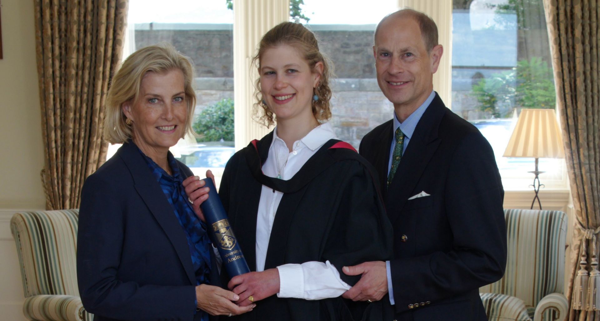 Duchess Sophie, Lady Louise and Prince Edward posing at her graduation