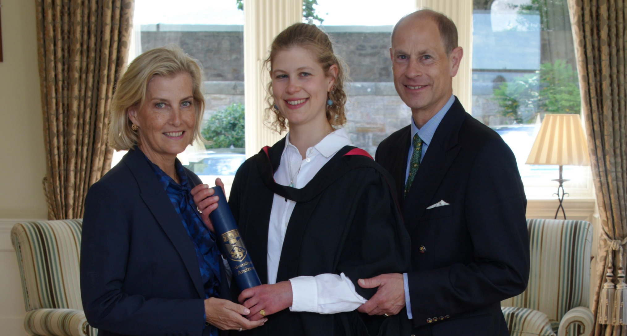 Duchess Sophie, Lady Louise and Prince Edward posing at her graduation