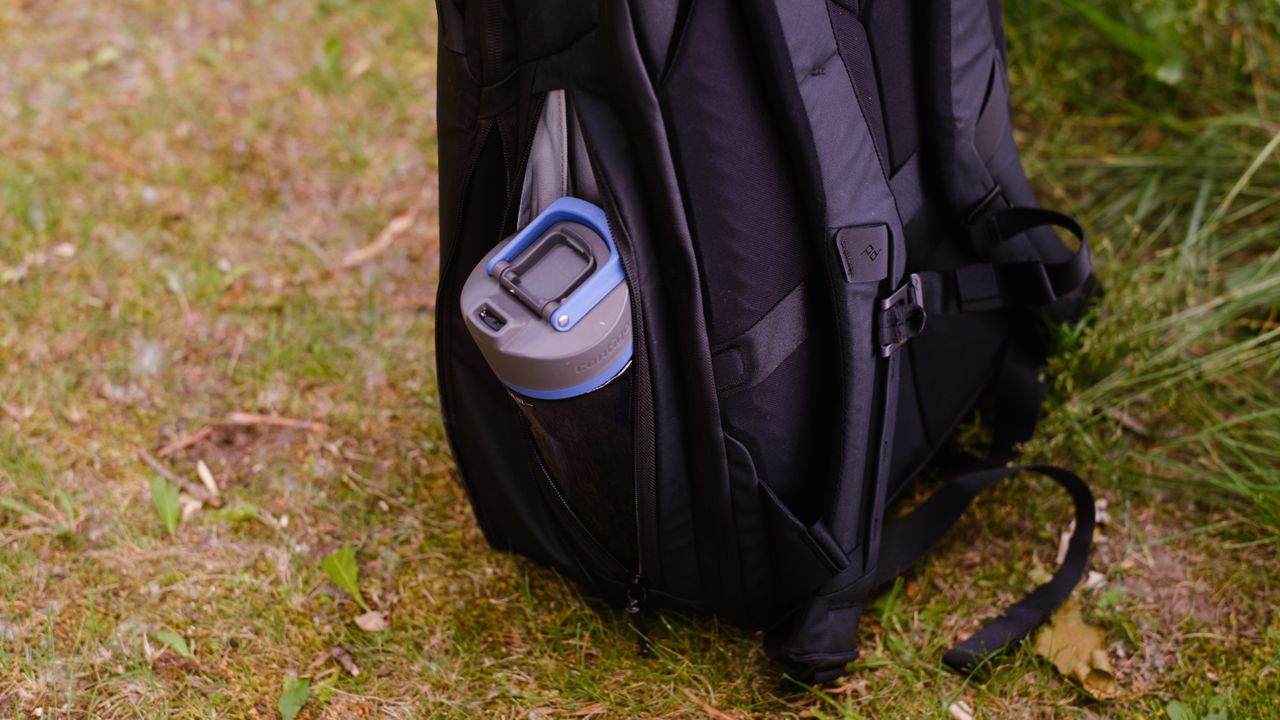 The Peak Design Travel Backpack 20L in use by a photographer