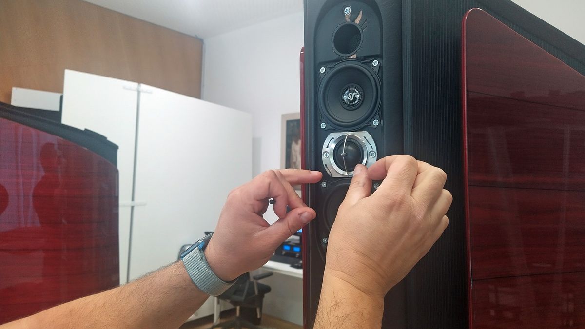 a worker in the sonus faber stereo speaker factory