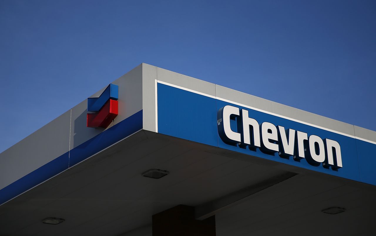 The Chevron logo on a gas station