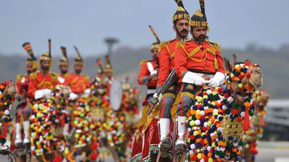 Pakistani soldiers on camels © AFP via Getty Images