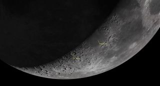 an illustration of the moon with craters and large, dark plains clearly visible