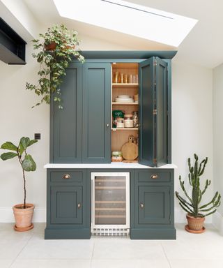 Pantry door ideas with bi-fold doors on the top half of a breakfast station
