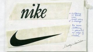 Paper and paste showing original Nike lettering and Swoosh logo