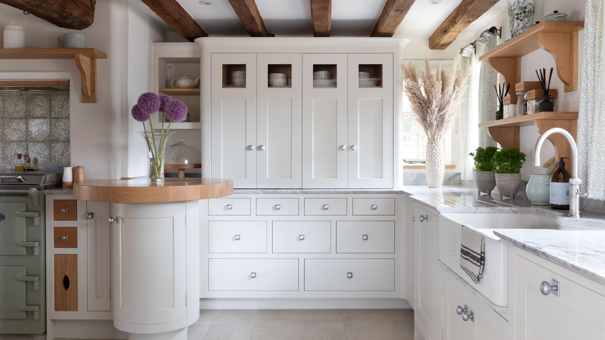 white shaker style kitchen in oak frame house