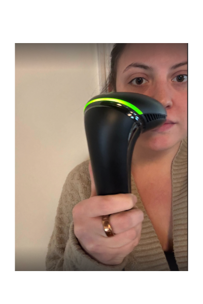 Sophia Vilensky, a 'Marie Claire' tester, tests the Sik'n 7 laser hair removal device.