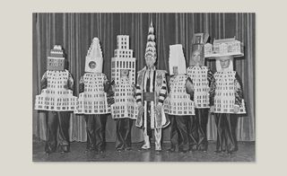This archive image from the book shows the famous Beaux-Arts Ball of 1931, a 'fête moderne' held at the Hotel Astor for which architects dressed up as buildings they had designed. Pictured (from left): A Stewart Walker as the Fuller Building; Leonard Schultze as the Waldorf-Astoria Hotel; Ely Jacques Kahn as the Squibb Building; William Van Alen as the Chrysler Building; Ralph Walker as the Irving Trust; DE Ward as the Metropolitan Tower; and Joseph Freedlander as the Museum of the City of New York.