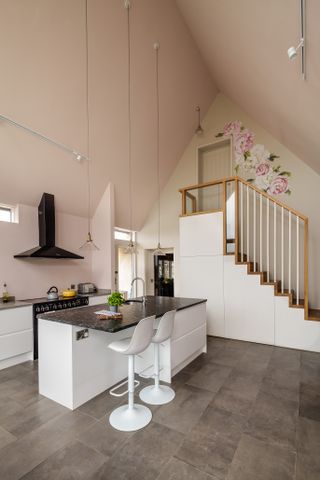 White modern staircase in kitchen