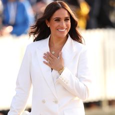 Meghan Markle in a white suit