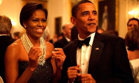 The Obamas paid a 20 percent tax rate in 2011, a higher rate than Mitt Romney pays, but lower than that paid by many Americans.