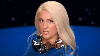 Meghan Trainor wearing all blue while singing in Been Like This Video.