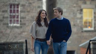 Kate Middleton (Meg Bellamy) and Prince William (Ed McVey) holding hands in The Crown season 6