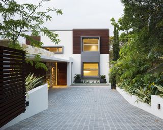 modern driveway with outdoor lighting