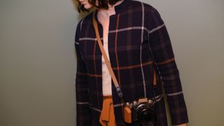 The Peak Design Form leather camera strap in the Amber color