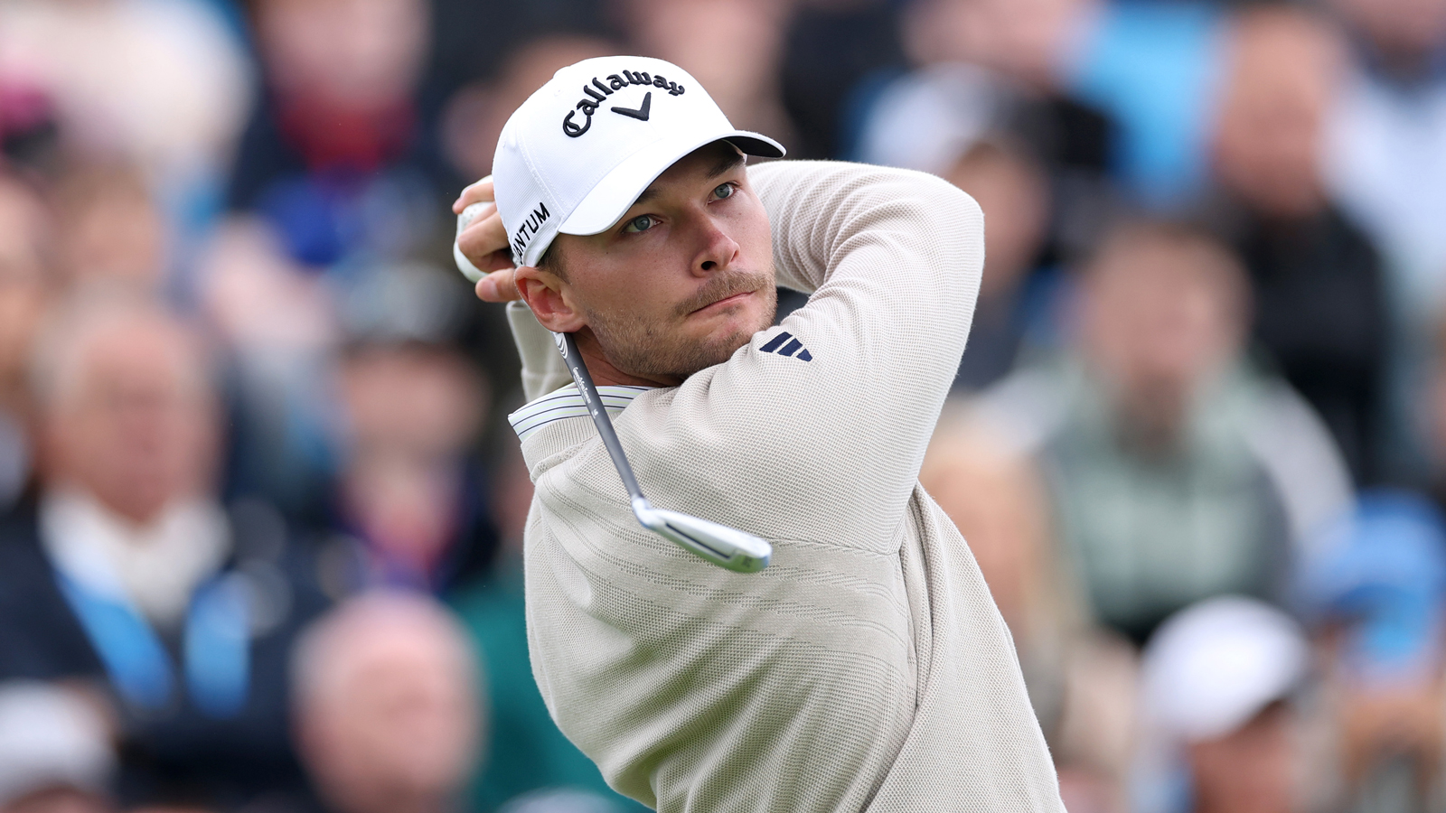 Nicolai Hojgaard hits an iron shot