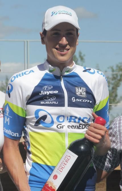 Jens Keukeleire gets a bottle of wine as winner of the stage