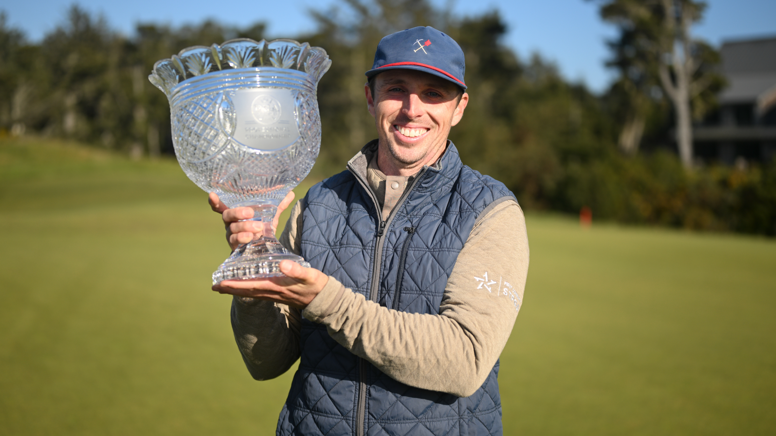 Jesse Droemer with the PGA Professional Championship trophy