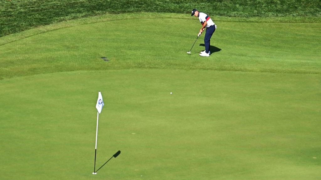 Collin Morikawa plays a Texas wedge onto the 7th green during his four-ball match on the second day of play in the 44th Ryder Cup 