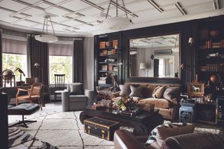 dark living room with black sofa