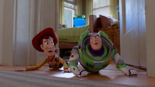 Woody (Tom Hanks) and Buzz Lightyear (Tim Allen) are watched by Lilypad (Greta Lee) in Toy Story 5.