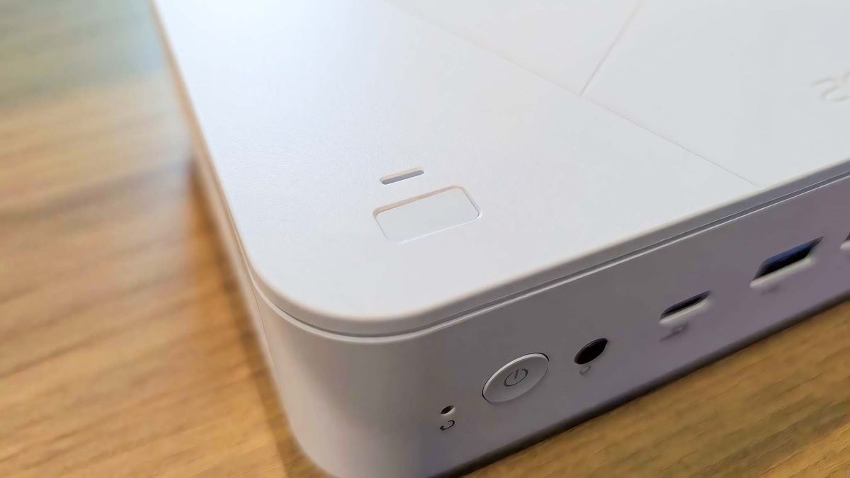 Closeup of the fingerprint reader on the top of the Acer Revo Box AI.