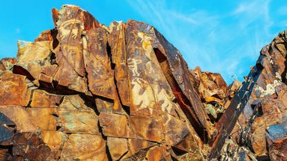 Ancient cave paintings on rocks in Karasay gorge, Taraz, Zhambyl Region, Kazakhstan.