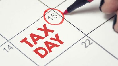 Picture of Tax Day Written on Calendar