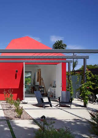 A bright red summerhouse