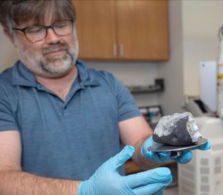 Researchers at The College of New Jersey have confirmed that this rock, which struck a house in Hopewell Township, New Jersey on May 8, 2023, is a 4.6-billion-year-old meteorite.