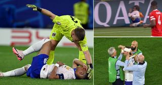 Austria's goalkeeper #13 Patrick Pentz speaks to France's forward #10 Kylian Mbappe as he lies on the football pitch after being injured during the UEFA Euro 2024 Group D football match between Austria and France at the Duesseldorf Arena in Duesseldorf on June 17, 2024.