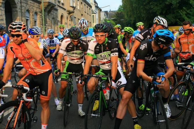 Riders await the start of the Tour de Neuss